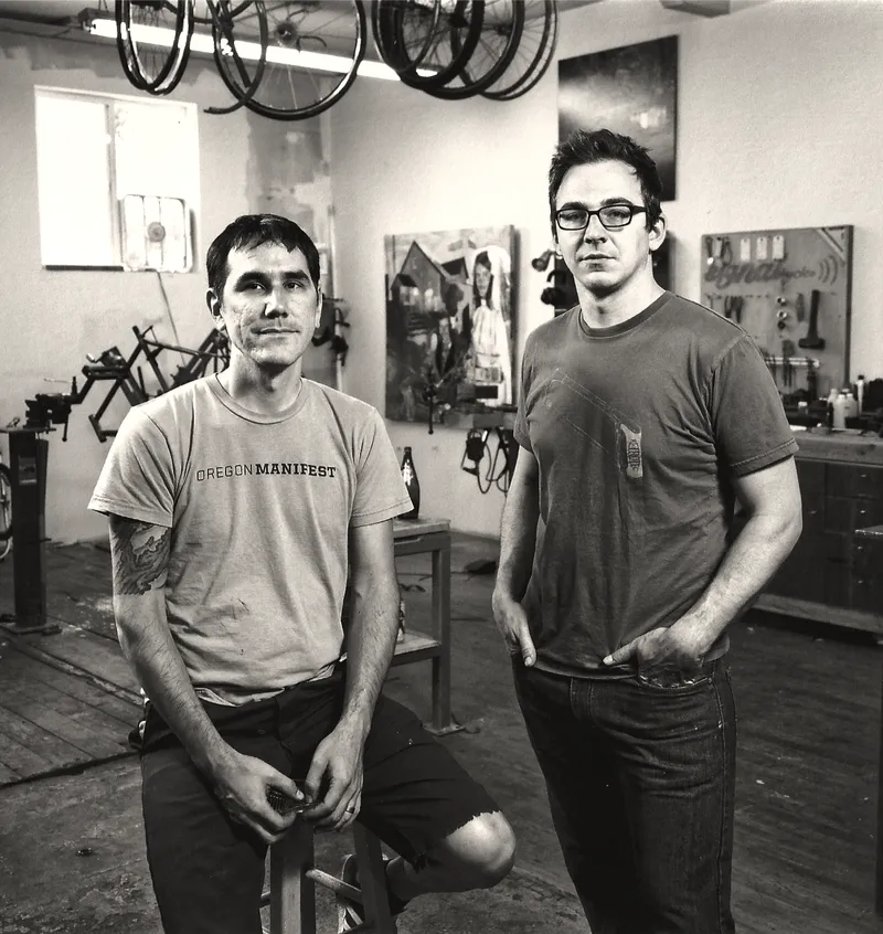 Matt Cardinal and Nate Meschke in the Signal Cycles workshop